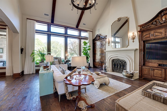 140 Manor Dr, Heath, TX 75032 - living area featuring high vaulted ceiling, a chandelier, a fireplace, wood finished floors, and beamed ceiling