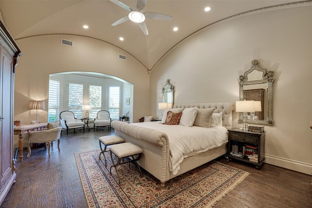 140 Manor Dr, Heath, TX 75032 - bedroom featuring dark wood-style floors, recessed lighting, arched walkways, baseboards, and lofted ceiling