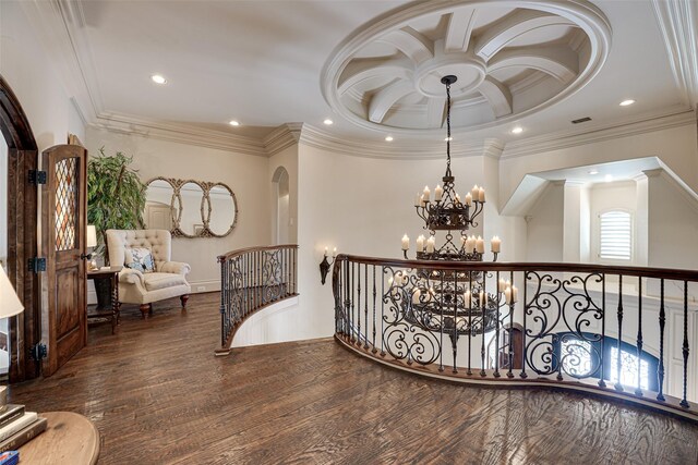 140 Manor Dr, Heath, TX 75032 - hall featuring a chandelier, wood finished floors, crown molding, arched walkways, and recessed lighting