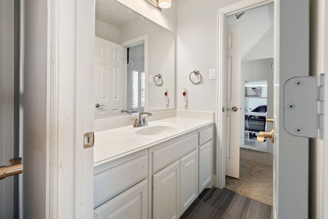 bathroom featuring visible vents and vanity
