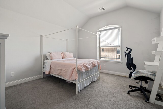 bedroom featuring lofted ceiling, baseboards, visible vents, and carpet flooring