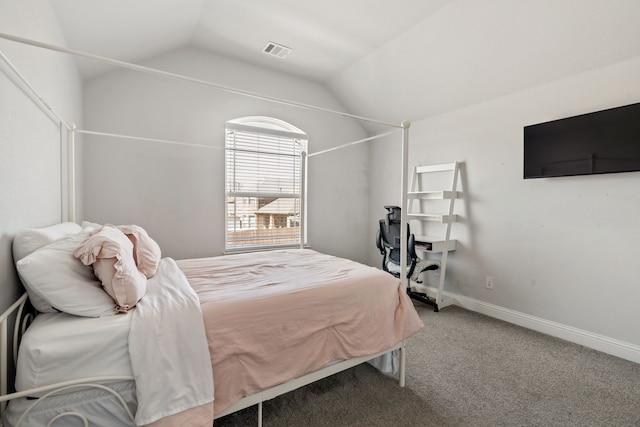 carpeted bedroom with lofted ceiling, visible vents, and baseboards