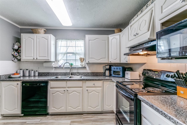 kitchen with black appliances, under cabinet range hood, white cabinetry, and a sink