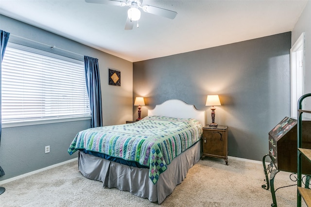 bedroom featuring ceiling fan, carpet floors, and baseboards