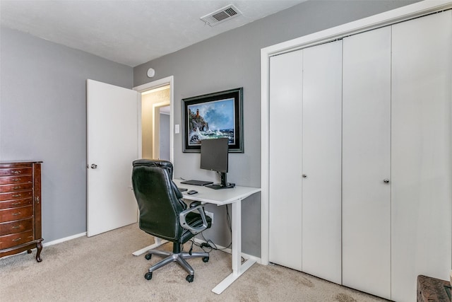 home office with baseboards, visible vents, and carpet flooring