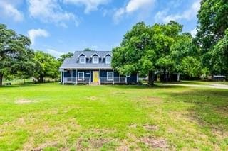 view of front of home with a front yard