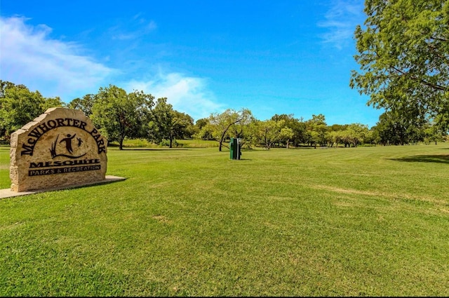 view of community featuring a yard