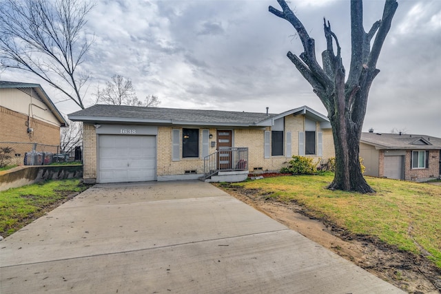 ranch-style home with brick siding, crawl space, an attached garage, and concrete driveway