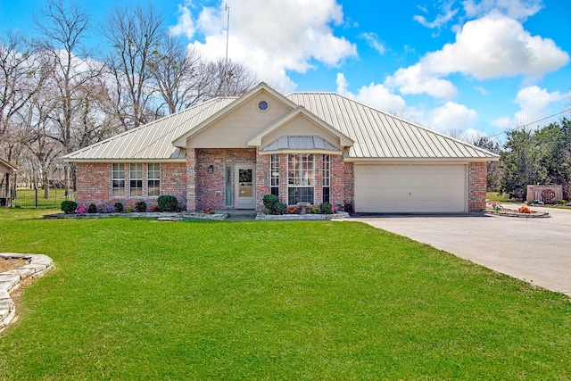 view of front of home featuring concrete driveway, brick siding, an attached garage, and a front yard