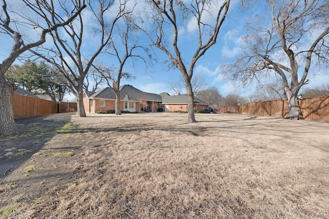 view of yard with fence