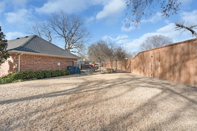 view of yard featuring fence