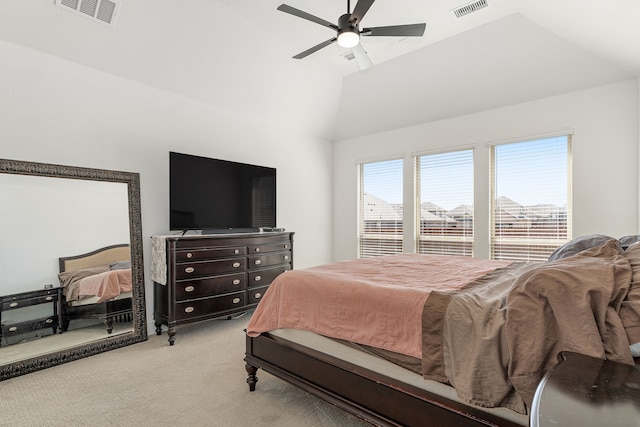 bedroom with carpet floors, ceiling fan, visible vents, and vaulted ceiling