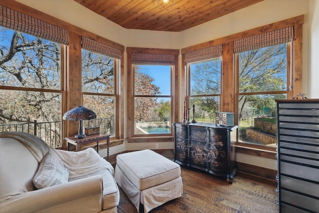 sunroom featuring wooden ceiling