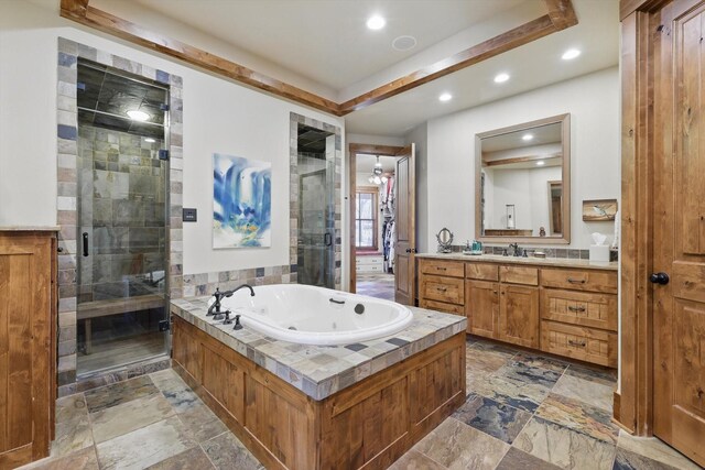 133 E Bozeman Ln, Fort Worth, TX 76108 - bathroom featuring vanity, stone tile floors, a stall shower, a tub with jets, and recessed lighting