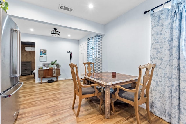 dining space with recessed lighting, visible vents, light wood finished floors, and baseboards