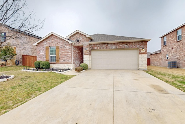 ranch-style house with concrete driveway, an attached garage, a front lawn, central AC, and brick siding