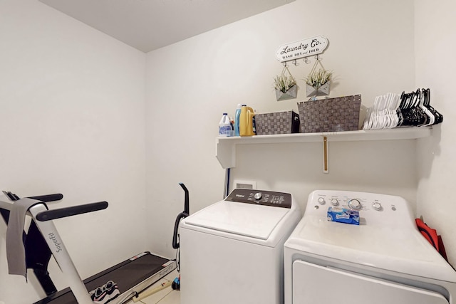 laundry area featuring washer and dryer and laundry area