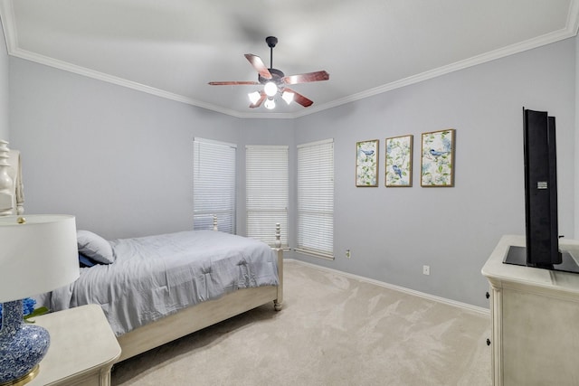 bedroom with ornamental molding, light colored carpet, baseboards, and a ceiling fan