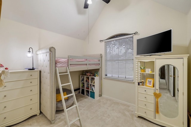 bedroom with lofted ceiling, carpet, baseboards, and a ceiling fan