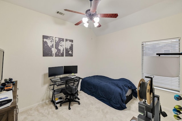 carpeted bedroom featuring lofted ceiling, ceiling fan, visible vents, and baseboards