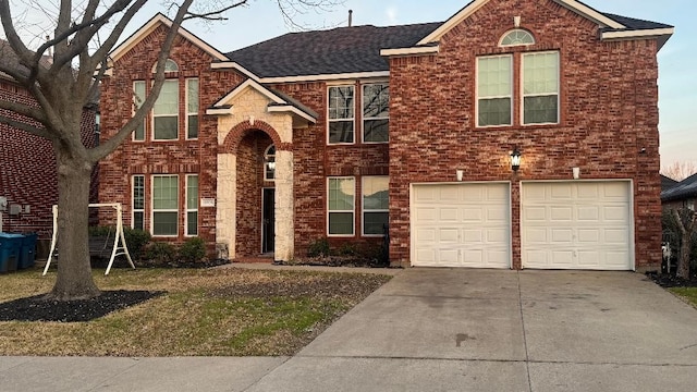 traditional-style home with driveway and brick siding