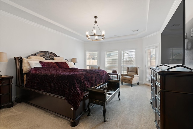 bedroom featuring a tray ceiling, light carpet, crown molding, and an inviting chandelier