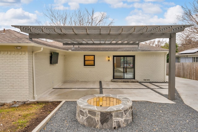 back of house with a fire pit, crawl space, a patio area, and fence