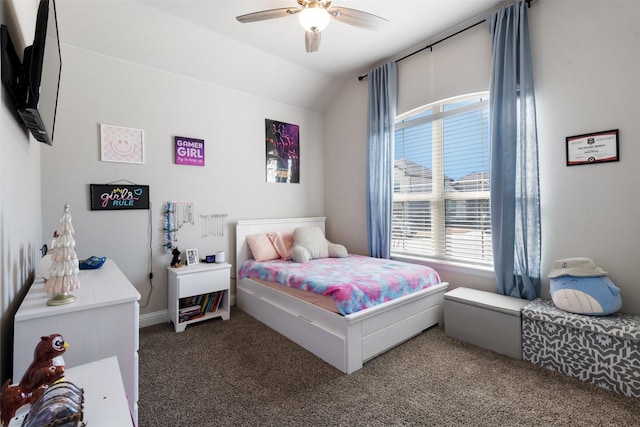 bedroom featuring a ceiling fan, lofted ceiling, and carpet flooring