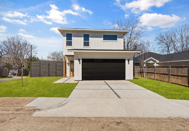 view of front of home featuring board and batten siding, a front yard, concrete driveway, and fence