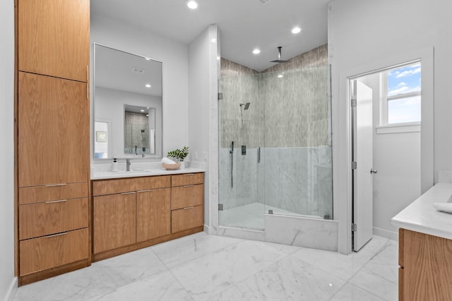 full bath with recessed lighting, visible vents, vanity, marble finish floor, and a stall shower