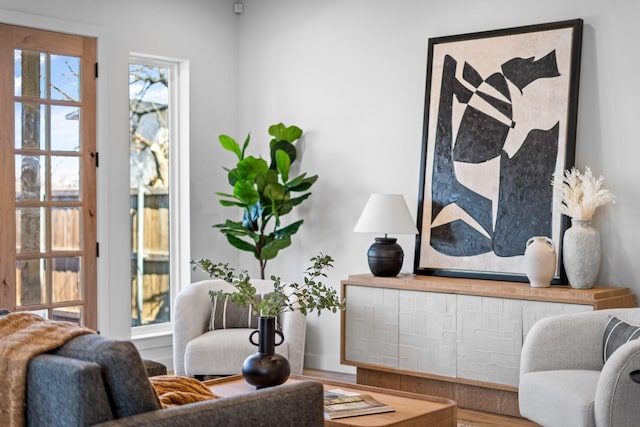 sitting room featuring wood finished floors