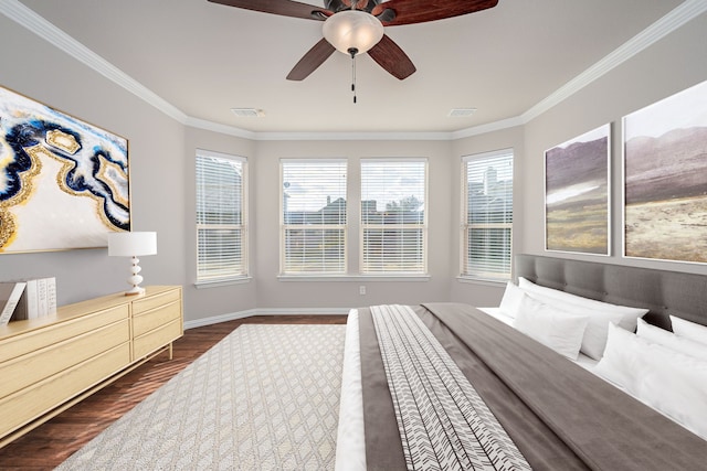 bedroom featuring baseboards, visible vents, ceiling fan, dark wood-type flooring, and crown molding