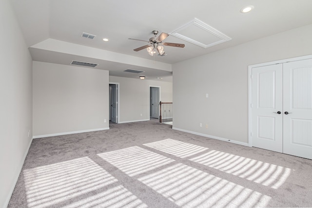 unfurnished bedroom with attic access, recessed lighting, visible vents, and baseboards