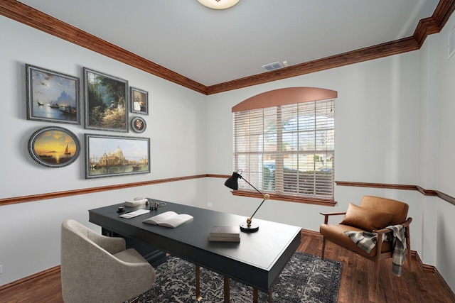 home office featuring crown molding, visible vents, and wood finished floors