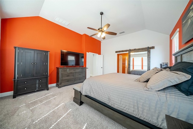 carpeted bedroom with a ceiling fan, vaulted ceiling, baseboards, and visible vents