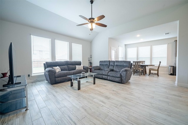 4130 Lagoon Pl, Royse City, TX 75189 - living room featuring light wood-style flooring, a ceiling fan, lofted ceiling, and plenty of natural light