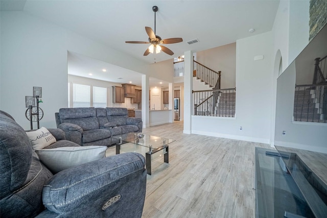 4130 Lagoon Pl, Royse City, TX 75189 - living area with stairs, light wood-style floors, and ceiling fan