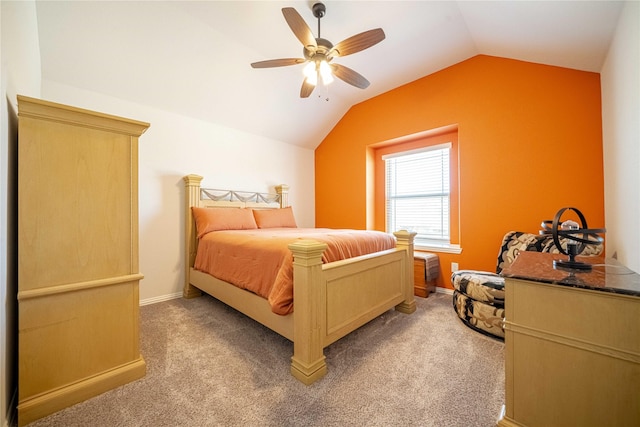 bedroom with baseboards, lofted ceiling, light colored carpet, and ceiling fan