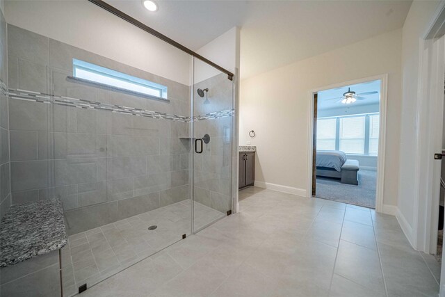 4130 Lagoon Pl, Royse City, TX 75189 - ensuite bathroom featuring healthy amount of natural light, a tile shower, tile patterned floors, and baseboards