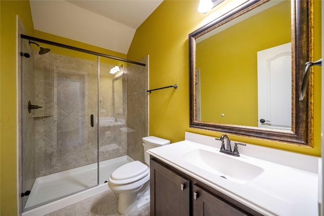 full bathroom featuring lofted ceiling, toilet, a stall shower, and vanity