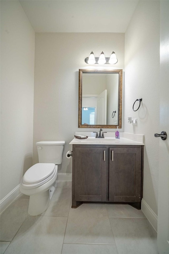 4130 Lagoon Pl, Royse City, TX 75189 - half bath with vanity, toilet, baseboards, and tile patterned floors