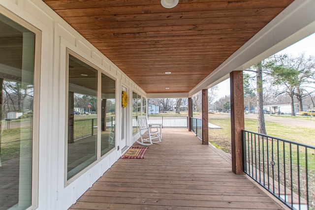 wooden deck with a porch