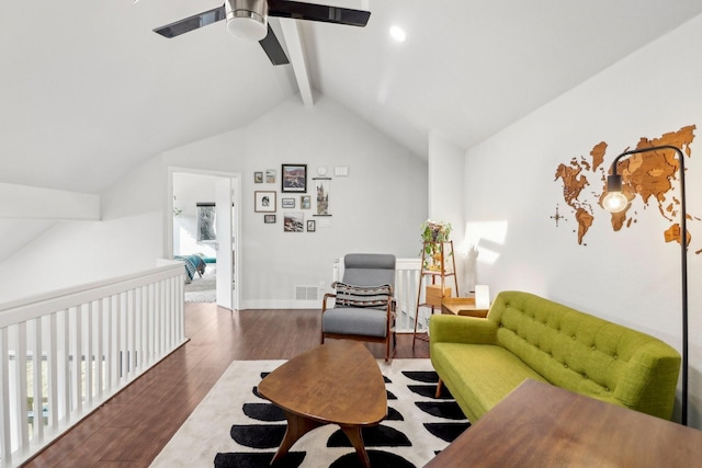 living area featuring vaulted ceiling with beams, wood finished floors, a ceiling fan, visible vents, and baseboards