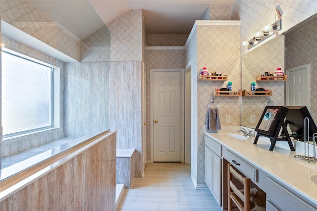 full bath featuring tile patterned flooring, tile walls, and vanity