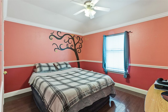 bedroom featuring crown molding, wood finished floors, baseboards, and ceiling fan