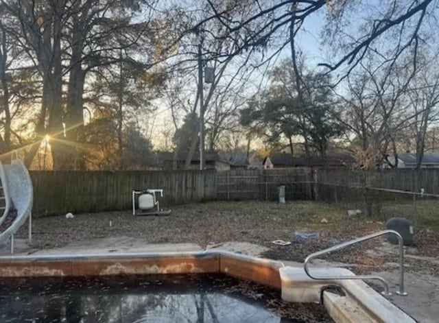 view of yard with a fenced backyard