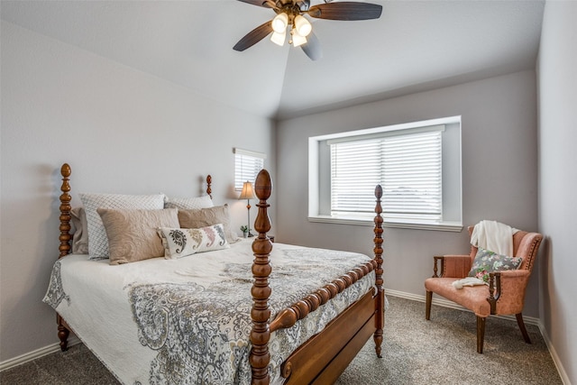 carpeted bedroom with lofted ceiling, ceiling fan, and baseboards