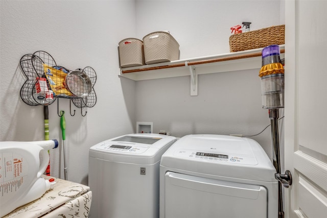 laundry room featuring laundry area and independent washer and dryer