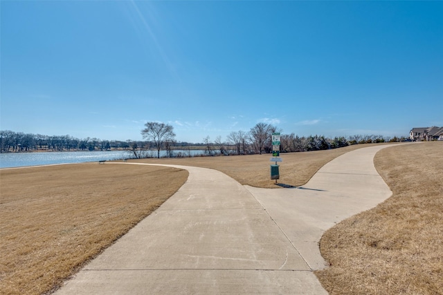 surrounding community featuring a yard