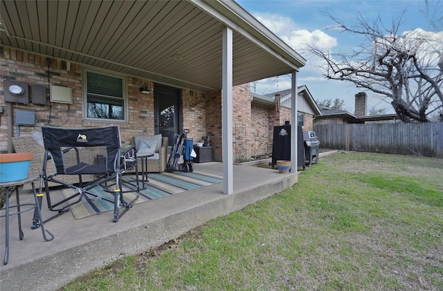 view of patio / terrace featuring fence and area for grilling